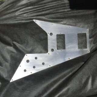 Flying V pickguard 67 style. Made from brushed steel. Awesome upgrade for your modern flying v