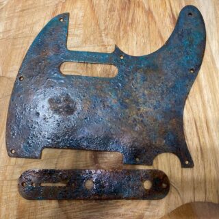 Rusted tele pickguard with blue patina and damaged textures. Extreme finish . Ships free